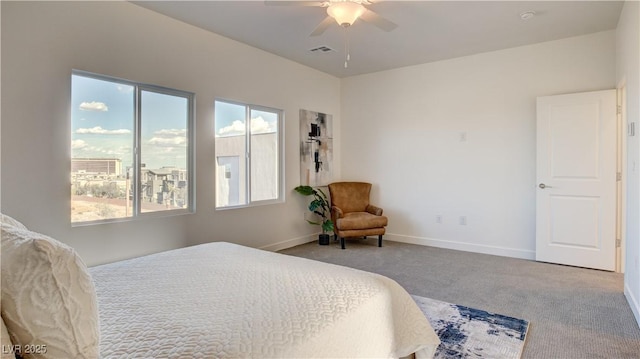 1157 Blossom Point St, Las Vegas, NV 89135 - bedroom with baseboards, multiple windows, visible vents, and carpet floors