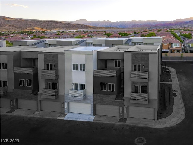 1157 Blossom Point St, Las Vegas, NV 89135 - view of property with a residential view, a garage, and a mountain view