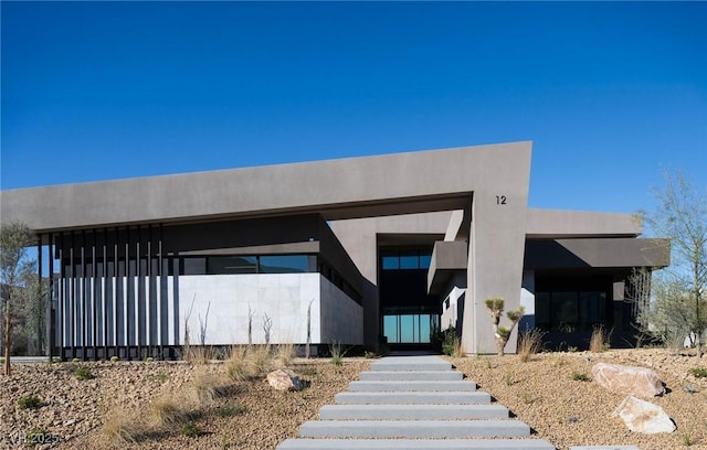 12 Chisel Crest Ct, Henderson, NV 89012 - view of front of house with board and batten siding