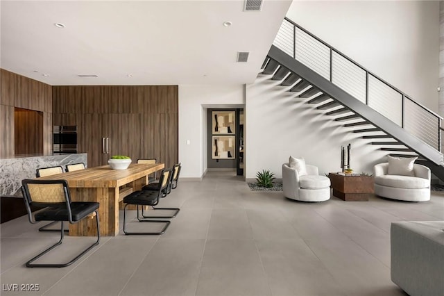 12 Chisel Crest Ct, Henderson, NV 89012 - dining space with stairs, baseboards, and visible vents