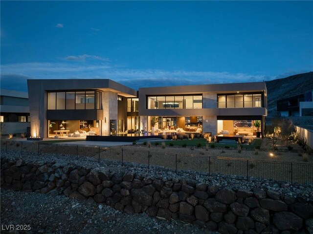 12 Chisel Crest Ct, Henderson, NV 89012 - rear view of property featuring fence private yard, a patio area, and outdoor lounge area