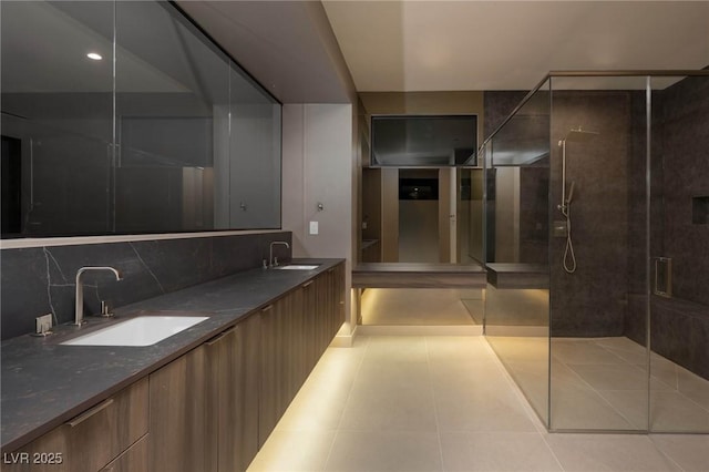 12 Chisel Crest Ct, Henderson, NV 89012 - bathroom with a stall shower, backsplash, double vanity, and a sink