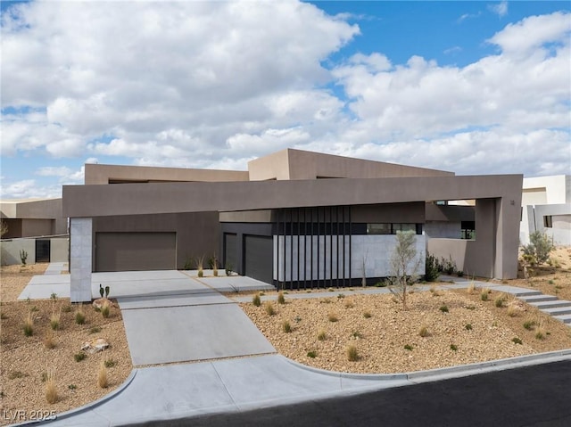 12 Chisel Crest Ct, Henderson, NV 89012 - view of front facade with an attached garage and driveway