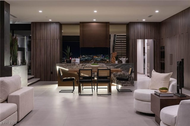 12 Chisel Crest Ct, Henderson, NV 89012 - kitchen with dark brown cabinets, open floor plan, modern cabinets, and recessed lighting
