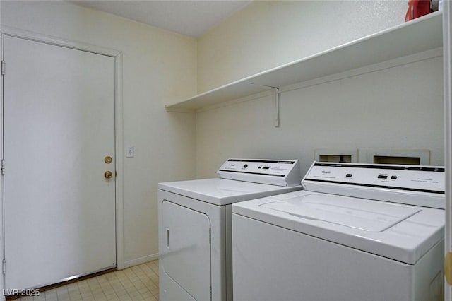 washroom with laundry area and independent washer and dryer