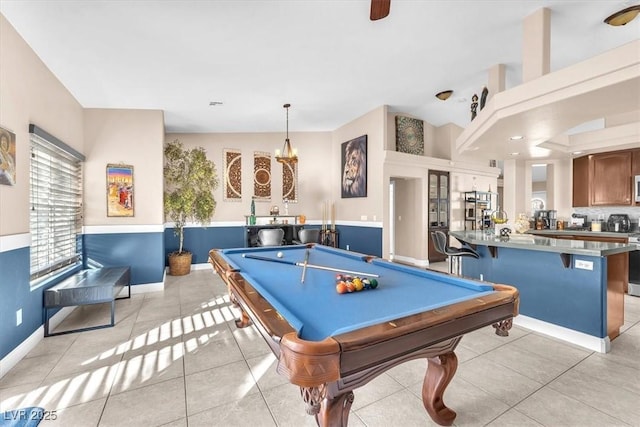 10113 Walhalla Plateau Ct, Las Vegas, NV 89148 - rec room with billiards table, light tile patterned floors, and baseboards