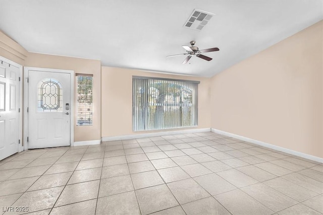 10113 Walhalla Plateau Ct, Las Vegas, NV 89148 - entrance foyer with plenty of natural light, a ceiling fan, baseboards, and light tile patterned flooring