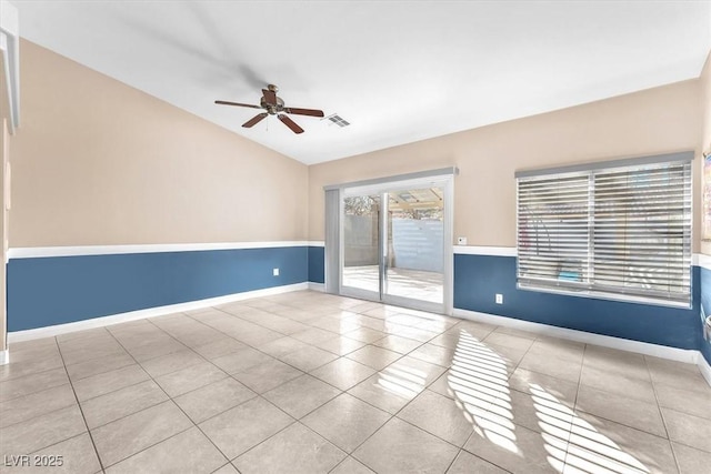 10113 Walhalla Plateau Ct, Las Vegas, NV 89148 - tiled empty room featuring lofted ceiling, a ceiling fan, and baseboards