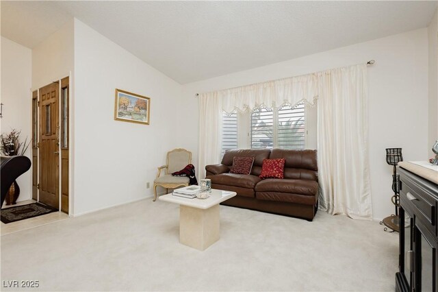 1528 Tonada Way, Las Vegas, NV 89117 - living area with carpet flooring and vaulted ceiling
