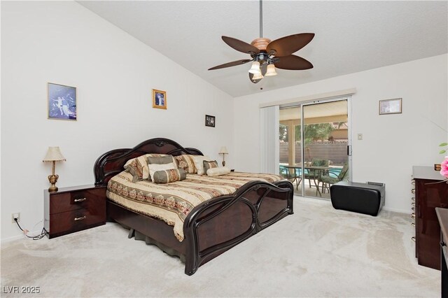 1528 Tonada Way, Las Vegas, NV 89117 - bedroom with lofted ceiling, access to exterior, light carpet, and ceiling fan