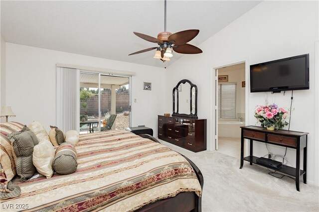 1528 Tonada Way, Las Vegas, NV 89117 - bedroom with access to exterior, light colored carpet, vaulted ceiling, a ceiling fan, and ensuite bathroom