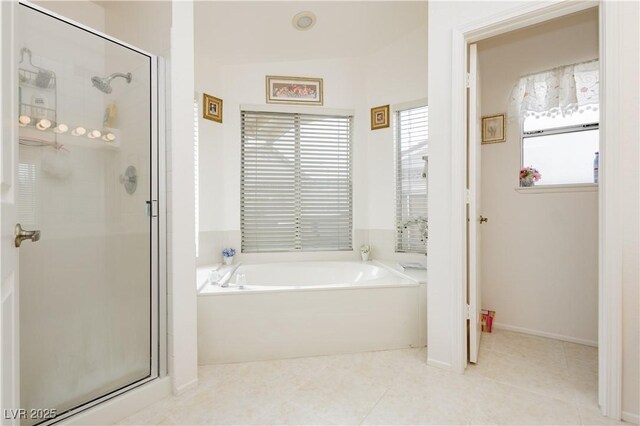 1528 Tonada Way, Las Vegas, NV 89117 - bathroom with a shower stall, a garden tub, and tile patterned flooring