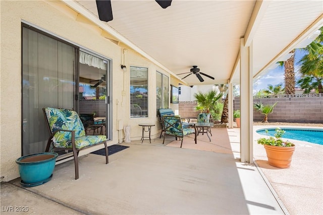 1528 Tonada Way, Las Vegas, NV 89117 - fenced backyard with a ceiling fan and a patio