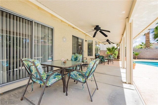 1528 Tonada Way, Las Vegas, NV 89117 - fenced backyard featuring outdoor dining space, a patio, and ceiling fan