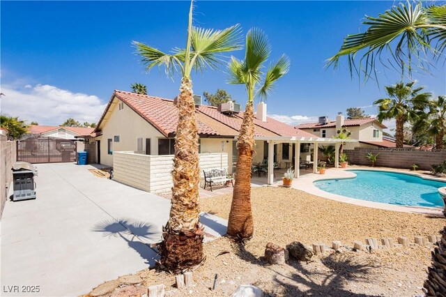 1528 Tonada Way, Las Vegas, NV 89117 - view of pool with a fenced backyard, a patio, and a gate