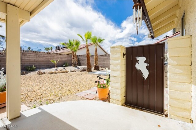 1528 Tonada Way, Las Vegas, NV 89117 - fenced backyard featuring a gate