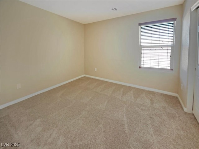 10331 Northern Hills Ave, Las Vegas, NV 89166 - empty room with light carpet, baseboards, and visible vents