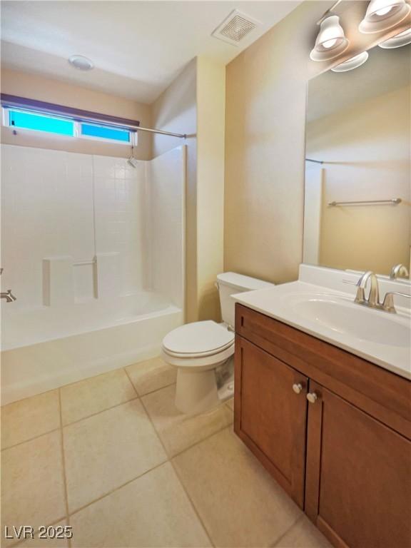 10331 Northern Hills Ave, Las Vegas, NV 89166 - full bathroom featuring toilet, shower / tub combination, vanity, visible vents, and tile patterned floors