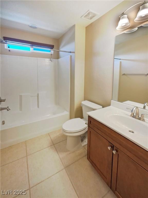 10331 Northern Hills Ave, Las Vegas, NV 89166 - full bathroom featuring toilet, tub / shower combination, tile patterned floors, visible vents, and vanity