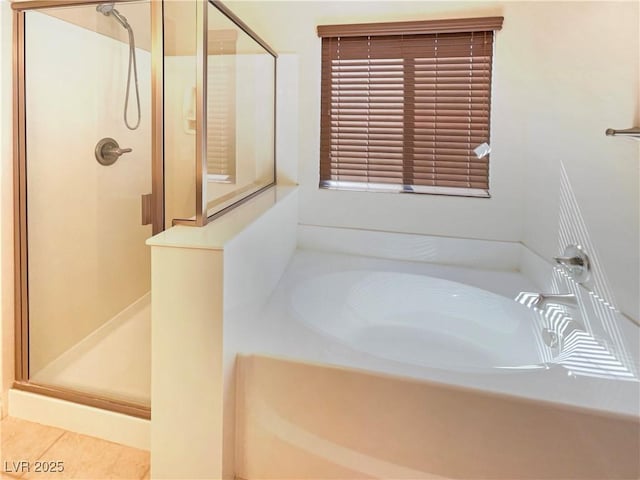 10331 Northern Hills Ave, Las Vegas, NV 89166 - full bathroom featuring a stall shower, tile patterned flooring, and a bath