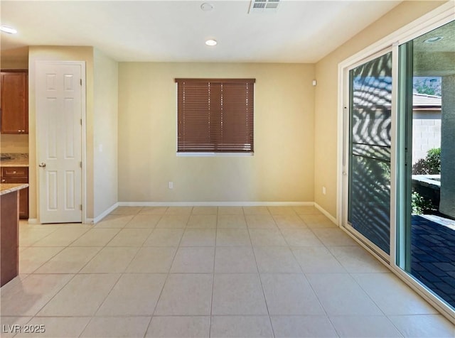 10331 Northern Hills Ave, Las Vegas, NV 89166 - empty room with light tile patterned floors, visible vents, baseboards, and recessed lighting