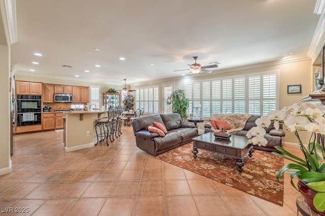 10314 Premia Pl, Las Vegas, NV 89135 - living room featuring baseboards, recessed lighting, crown molding, and ceiling fan