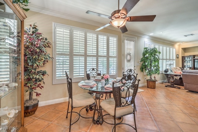 10314 Premia Pl, Las Vegas, NV 89135 - dining room featuring crown molding, a wealth of natural light, ceiling fan, and light tile patterned floors