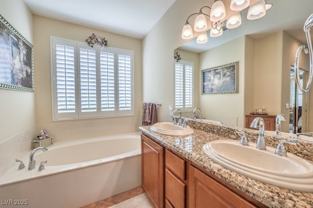 10314 Premia Pl, Las Vegas, NV 89135 - full bathroom featuring a sink, a wealth of natural light, and a garden tub