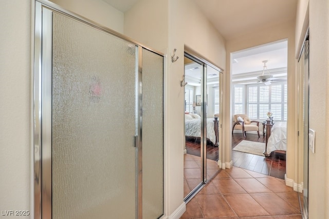 10314 Premia Pl, Las Vegas, NV 89135 - full bath featuring a stall shower, tile patterned flooring, ensuite bathroom, and a ceiling fan