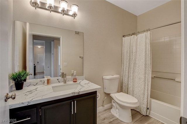 full bath featuring shower / bath combination with curtain, toilet, wood finished floors, and vanity