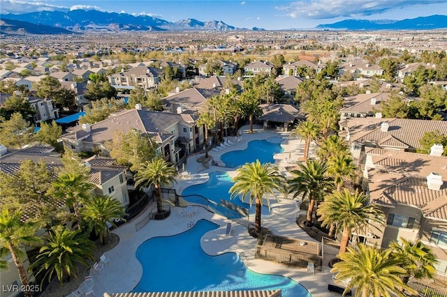 aerial view featuring a mountain view and a residential view
