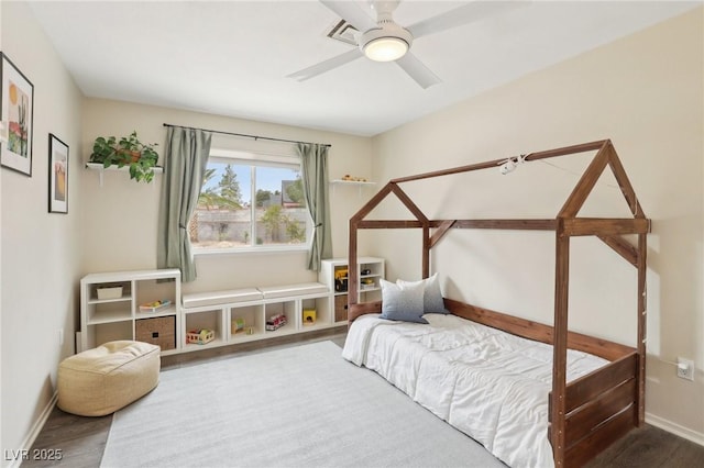 3155 Duneville St, Las Vegas, NV 89146 - bedroom featuring baseboards, a ceiling fan, visible vents, and wood finished floors