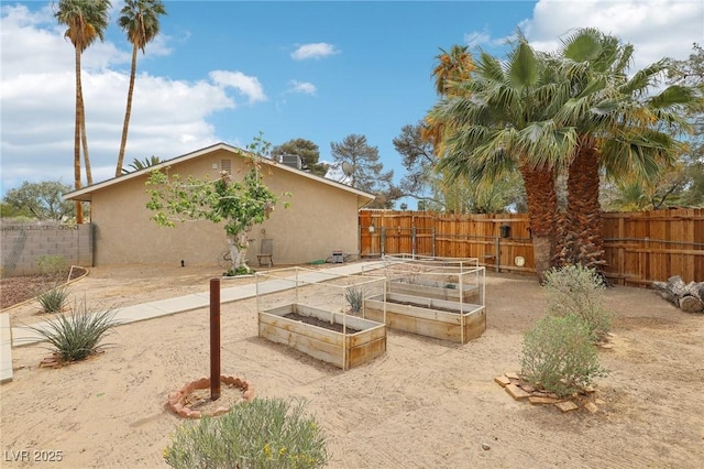 3155 Duneville St, Las Vegas, NV 89146 - view of yard with a garden and fence