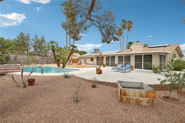 3155 Duneville St, Las Vegas, NV 89146 - view of swimming pool with a patio, a sunroom, and a fenced in pool