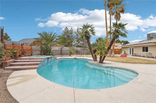 3155 Duneville St, Las Vegas, NV 89146 - view of pool featuring a patio area, a pool with connected hot tub, and a fenced backyard