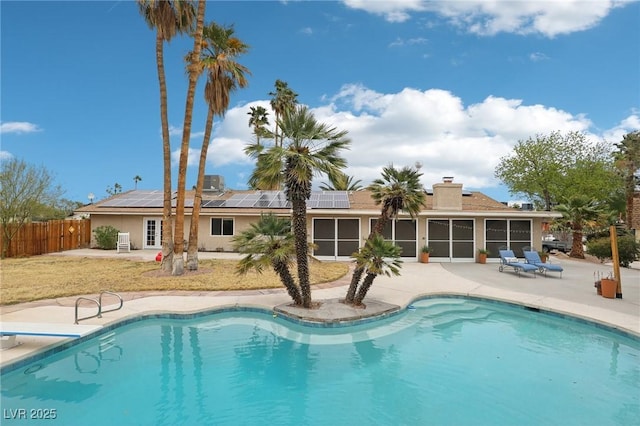 3155 Duneville St, Las Vegas, NV 89146 - view of pool featuring a sunroom, a patio, a fenced in pool, and fence