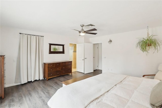 3155 Duneville St, Las Vegas, NV 89146 - bedroom with visible vents, wood finished floors, and ceiling fan
