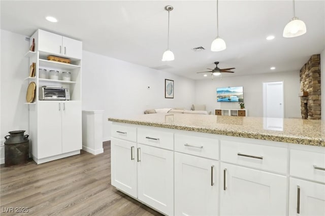 3155 Duneville St, Las Vegas, NV 89146 - kitchen with ceiling fan, decorative light fixtures, light wood-type flooring, and visible vents
