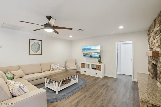 3155 Duneville St, Las Vegas, NV 89146 - living room with ceiling fan, recessed lighting, visible vents, and wood finished floors
