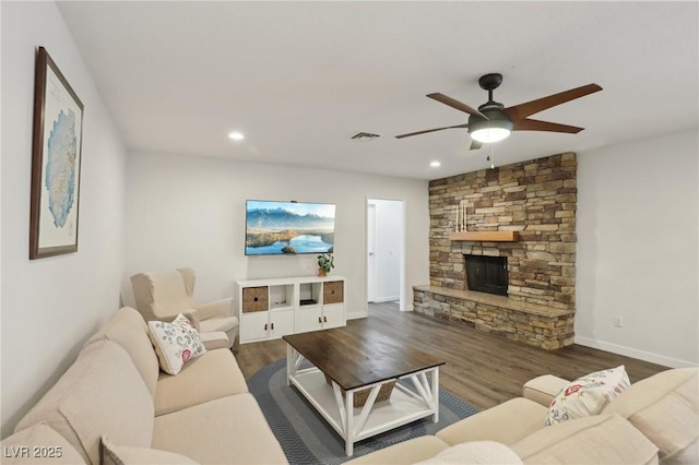 3155 Duneville St, Las Vegas, NV 89146 - living room featuring wood finished floors, a fireplace, visible vents, baseboards, and ceiling fan
