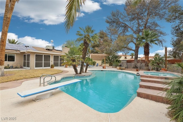 3155 Duneville St, Las Vegas, NV 89146 - view of swimming pool featuring fence, a patio, a fenced in pool, an in ground hot tub, and a sunroom