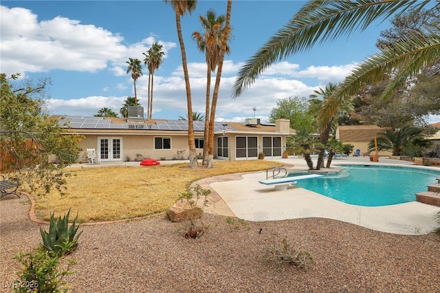 3155 Duneville St, Las Vegas, NV 89146 - pool with a sunroom, a patio area, a diving board, and french doors