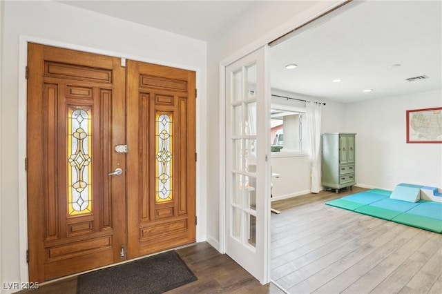 3155 Duneville St, Las Vegas, NV 89146 - entryway with recessed lighting, baseboards, visible vents, and wood finished floors