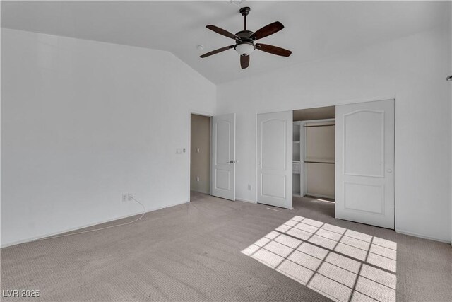 1717 Double Arch Ct, Las Vegas, NV 89128 - unfurnished bedroom featuring vaulted ceiling, carpet, ceiling fan, and a closet
