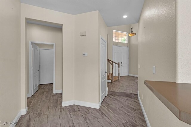 1717 Double Arch Ct, Las Vegas, NV 89128 - corridor with wood finished floors and baseboards