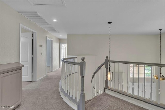 1717 Double Arch Ct, Las Vegas, NV 89128 - hall with light colored carpet, baseboards, an upstairs landing, and recessed lighting