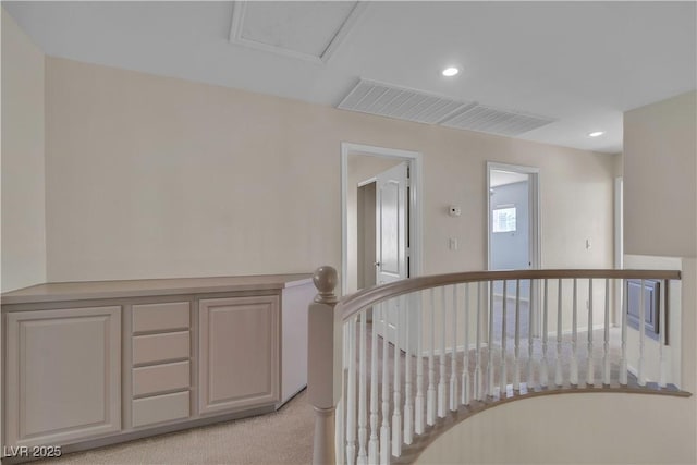 hall featuring recessed lighting, light carpet, an upstairs landing, and visible vents