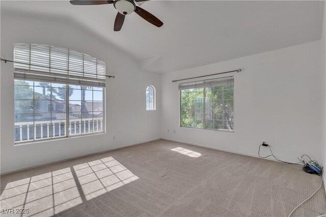 1717 Double Arch Ct, Las Vegas, NV 89128 - spare room with vaulted ceiling, carpet, baseboards, and a ceiling fan