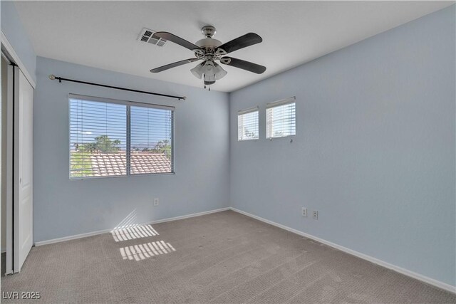 1717 Double Arch Ct, Las Vegas, NV 89128 - unfurnished room featuring baseboards, carpet flooring, and visible vents