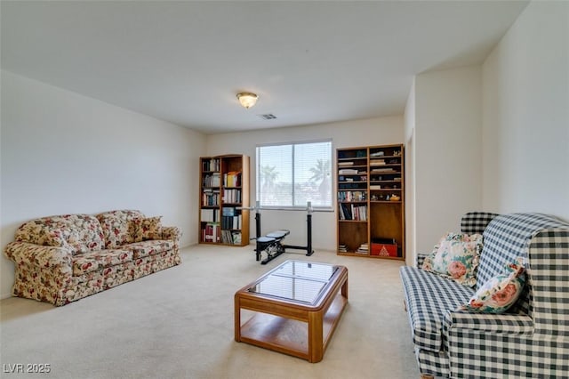 living area with carpet